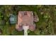 Stunning aerial view of the property highlighting the large backyard, basketball court, and entertainment space at 6122 Maroon Peak Pl, Castle Rock, CO 80108