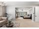 Large main bedroom suite with a sitting area, fireplace, and a view of the bedroom at 6122 Maroon Peak Pl, Castle Rock, CO 80108