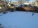 Spacious backyard covered in snow, features a shed at 2603 W 100Th Pl, Federal Heights, CO 80260