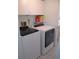 Laundry room with washer and dryer, and ample storage at 2603 W 100Th Pl, Federal Heights, CO 80260