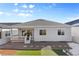 House exterior showcasing backyard patio and landscaping at 5695 Cadara Way, Parker, CO 80134