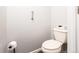 Small bathroom with toilet and grab bar at 3200 Masters Pt, Castle Rock, CO 80104