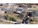 Aerial view of the property showcasing the backyard, deck, pergola, and surrounding neighborhood at 954 E Costilla Ave, Centennial, CO 80122
