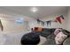 Large basement is perfect for entertaining, featuring a seating area and decorative banners at 954 E Costilla Ave, Centennial, CO 80122