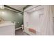 Modern bathroom featuring tile flooring, a bathtub, a shower and an updated vanity at 954 E Costilla Ave, Centennial, CO 80122