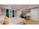 Relaxing bedroom with a work station, natural light, and a comfortable bed at 954 E Costilla Ave, Centennial, CO 80122