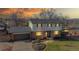 Charming two-story home with brick accents, a well-kept lawn and an American flag at 954 E Costilla Ave, Centennial, CO 80122