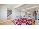Bright living room with hardwood floors, fireplace, and staircase, offering a welcoming space at 954 E Costilla Ave, Centennial, CO 80122