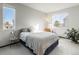 Bright bedroom with ample natural light and neutral decor at 11659 W 44Th Ave, Wheat Ridge, CO 80033