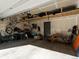 Organized garage with ample storage space, shelving, and room for parking at 11659 W 44Th Ave, Wheat Ridge, CO 80033