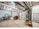 Unfinished basement with exposed beams and mechanicals; ready for customization at 270 Maddox Ln, Erie, CO 80516