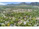 Beautiful aerial shot showcasing the property's location amidst a vibrant, green neighborhood and nearby urban amenities at 831 Crescent Dr, Boulder, CO 80303