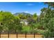 A beautiful backyard featuring a lawn and trees with mountain views, perfect for enjoying the outdoors at 831 Crescent Dr, Boulder, CO 80303
