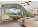 Bright bedroom featuring large windows with mountain views, bringing the outdoors in with natural light at 831 Crescent Dr, Boulder, CO 80303