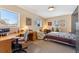 Bright bedroom featuring a desk, day bed, area rug, and natural light from multiple windows at 831 Crescent Dr, Boulder, CO 80303