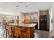 Spacious kitchen featuring an island with seating and modern appliances at 831 Crescent Dr, Boulder, CO 80303