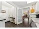 Laundry room with modern appliances, ample white cabinetry, and tiled floors at 831 Crescent Dr, Boulder, CO 80303