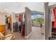 Walk-in closet with closet system, storage, and an opening to a bedroom with mountain views at 831 Crescent Dr, Boulder, CO 80303