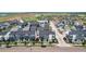 Planned community with various modern townhomes and landscaping details at 2052 Alcott Way, Broomfield, CO 80023