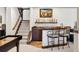 Basement bar with a beer tap system and seating at 1151 Kenosha Dr, Larkspur, CO 80118