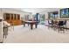 Spacious basement with a pool table and game area at 1151 Kenosha Dr, Larkspur, CO 80118
