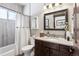 Clean bathroom with a soaking tub and modern vanity at 1151 Kenosha Dr, Larkspur, CO 80118