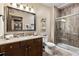 Modern bathroom with large walk-in shower and granite vanity at 1151 Kenosha Dr, Larkspur, CO 80118
