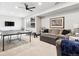 Basement game room with ping pong table and comfortable seating at 1151 Kenosha Dr, Larkspur, CO 80118