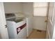 Practical laundry room equipped with a modern washing machine and dryer, maximizing convenience and efficiency at 20630 E Hamilton Ave, Aurora, CO 80013