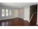 Inviting living room boasting hardwood floors and a staircase to the upper level at 20630 E Hamilton Ave, Aurora, CO 80013