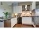 Bright kitchen with stainless steel appliances, granite counters, and ample cabinet space at 5455 Landmark Pl # 1403, Greenwood Village, CO 80111