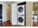 Convenient in-unit laundry closet with stacked washer and dryer, maximizing space at 5455 Landmark Pl # 1403, Greenwood Village, CO 80111