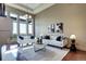 Well-lit living room featuring contemporary decor, comfortable seating, and stunning views at 5455 Landmark Pl # 1403, Greenwood Village, CO 80111