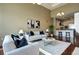 Bright and inviting living room with contemporary furnishings and an open concept design at 5455 Landmark Pl # 1403, Greenwood Village, CO 80111