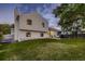 A view of the backyard and back exterior of this two story home at 7021 S Eudora St, Centennial, CO 80122