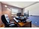 This home office features modern equipment and a work space with great natural light at 8403 Chase Dr, Arvada, CO 80003