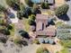 Aerial view showcasing the property, including a large deck with gazebo, basketball court, and mature landscaping at 7570 Windford, Parker, CO 80134
