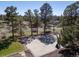 Elevated view of a backyard basketball court, great for recreation and staying active within the comforts of your home at 7570 Windford, Parker, CO 80134