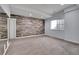 Unfinished basement space with natural light. Offers potential for customization and expansion to suit individual needs at 8056 E 35Th Ave, Denver, CO 80238