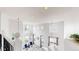 Bright open foyer featuring large windows, high ceilings, and stylish decor that is perfect for entertaining at 7597 Bison Ct, Littleton, CO 80125