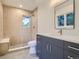 Modern bathroom with a walk-in shower and sleek vanity at 3961 S Clermont St, Cherry Hills Village, CO 80113