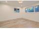 Bright bedroom with hardwood floors and natural light from large windows at 3961 S Clermont St, Cherry Hills Village, CO 80113
