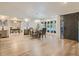 Dining room filled with natural light featuring hardwood floors and stylish chandelier at 3961 S Clermont St, Cherry Hills Village, CO 80113