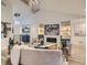Elegant living room featuring vaulted ceilings, a fireplace, and neutral decor at 3961 S Clermont St, Cherry Hills Village, CO 80113