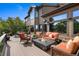 Enjoy the views from the deck with comfortable seating, fire pit, and plenty of room for entertaining at 34 Amaranth Dr, Littleton, CO 80127