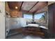 Spa-like main bathroom boasts a soaking tub, walk-in shower, and stunning views at 34 Amaranth Dr, Littleton, CO 80127