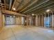 Unfinished basement with exposed framing, utilities, and concrete floor at 1826 Sunshine Ave, Longmont, CO 80504