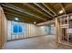 Unfinished basement with exposed framing, utilities, and concrete floor at 1826 Sunshine Ave, Longmont, CO 80504