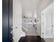 Welcoming foyer with staircase, neutral color palette, and elegant flooring leading into the home at 1826 Sunshine Ave, Longmont, CO 80504