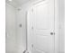 Modern bathroom featuring a sleek glass-enclosed shower with white subway tile at 1826 Sunshine Ave, Longmont, CO 80504